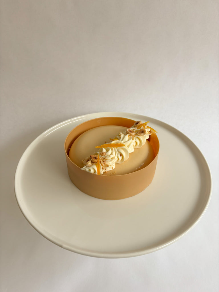 Passion, orange and hazelnut entremet