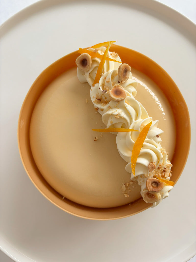 Passion, orange and hazelnut entremet