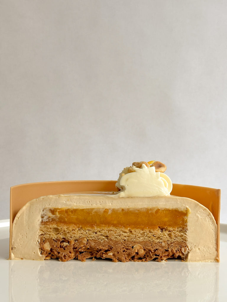 Passion, orange and hazelnut entremet